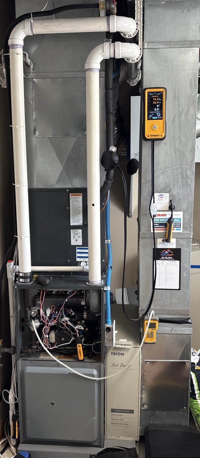 Furnace tune-up inspection with combustion analyzer and HVAC service testing